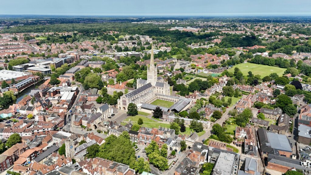 Vibrant aerial shot of Sheringham beach and town on a sunny day in Norfolk, England